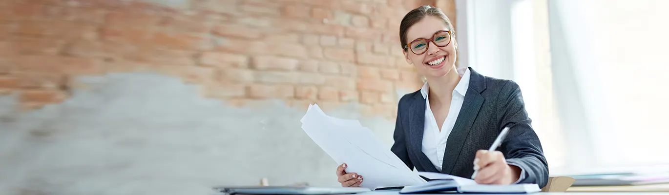 Accounting professional holding paper on hand